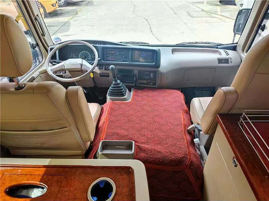 11 zitplaatsen tweedehands Toyota Coaster minibus met handgeschakelde versnellingsbak