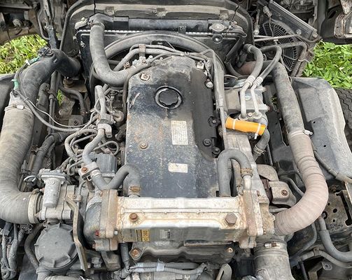 Gebruikte vrachtwagen Isuzu ELF 600p vrachtwagen 4KH1 Dieselmotor en witte carrosserie