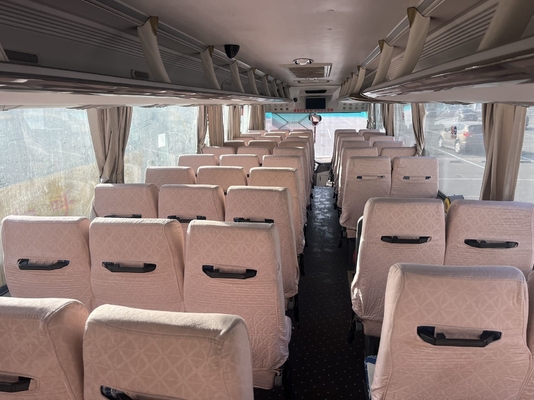 Een tweedehands gele King Long bus met een 63-zits Yuchai motor en handgeschakelde versnellingsbak
